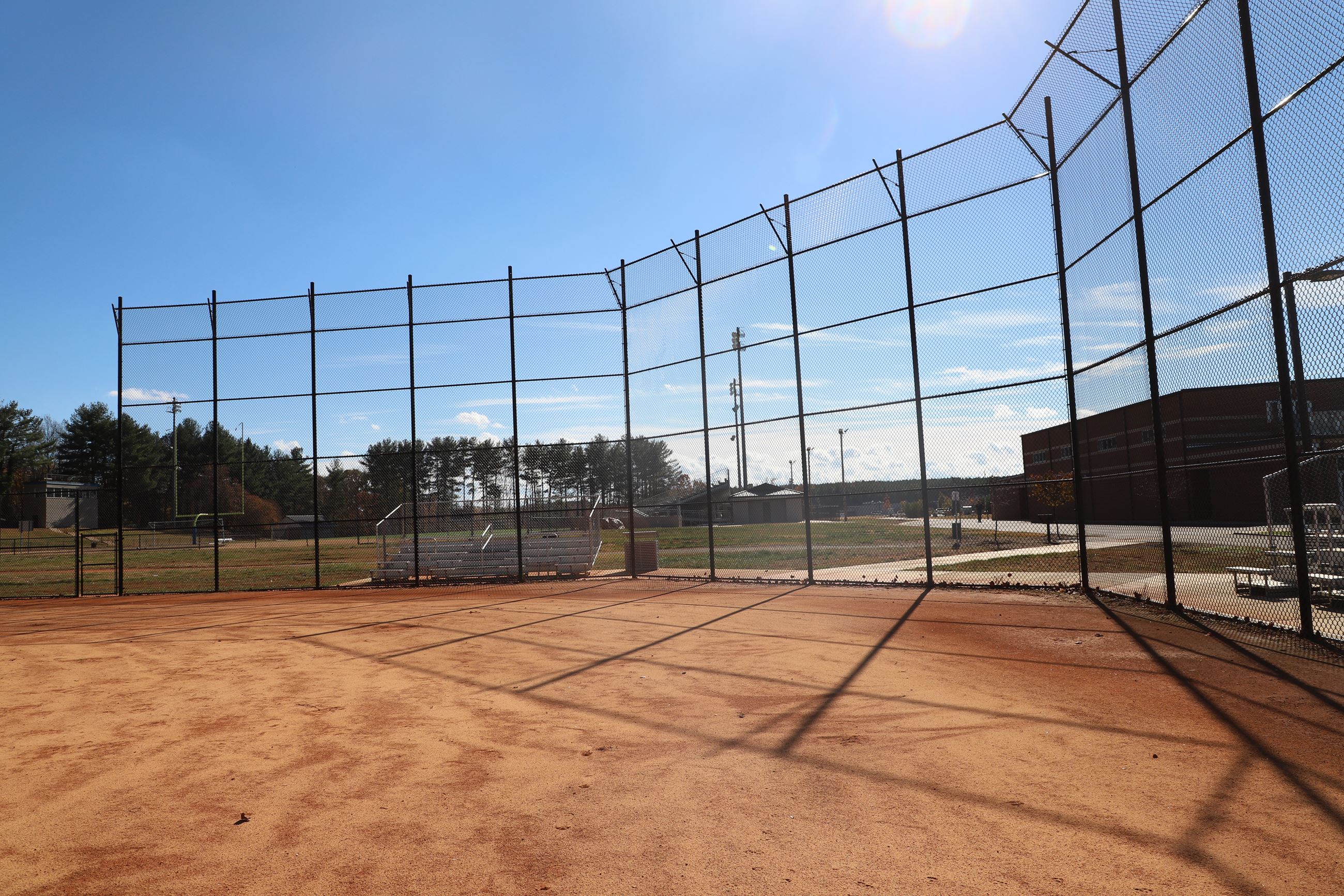 baseball field with bleachers in the background